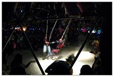 Burning Man is partly incredible engineering and art, partly a crazy scene like out of Mad Max, and partly one big fun freak show. Here is pugil stick fighting on bungee straps hanging from the ceiling supports of a geo dome. Spectators are cheering them on, climbing all over the dome. Awesome fun.
