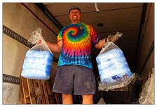 Volunteering is integral to burning man, with hundreds of ways to lend a hand. Definitely a good workout, it’s cool work on the ice truck.